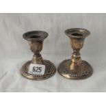 Pair of candlesticks with shell and gadroon borders - 3" high - B'ham 1910 by A&JZ