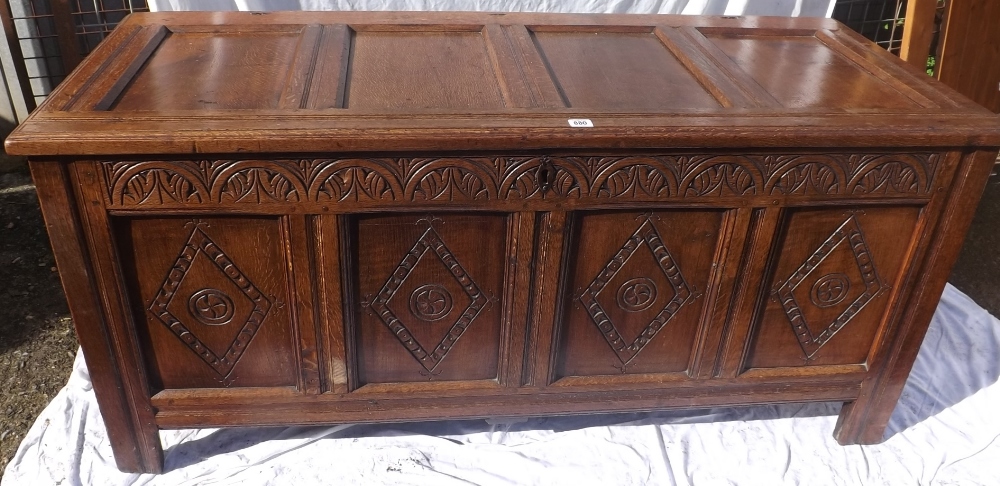 Antique oak coiffer with panel top and carved front - 55" wide