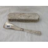 Oriental silver shoe horn stamped WINGONO and a similar brush