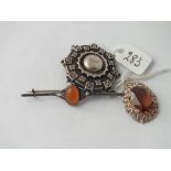 Three assorted silver brooches
