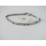 14CT GOLD WHITE STONE LINE BRACELET - 7.4GMS