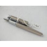 Silver coloured Parker fountain pen