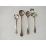 Three shell-back Georgian salt spoons and another