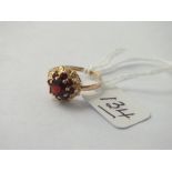 9ct ring with garnet in fancy setting - size X - 2.06gms