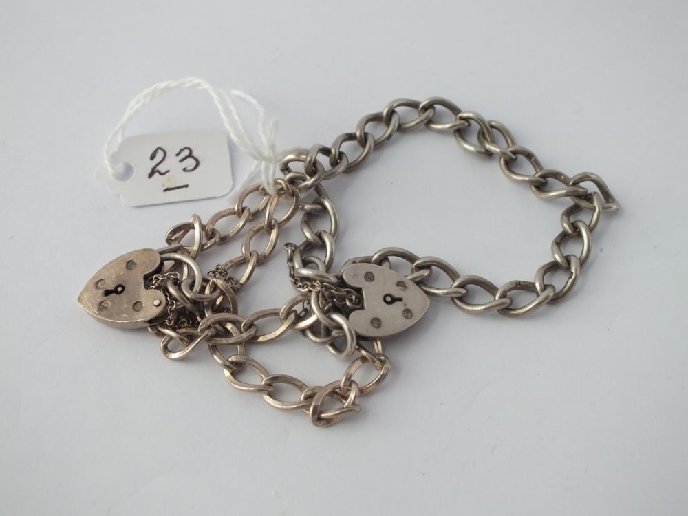 Two silver bracelets with padlock clasps