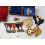 Cased miniature Masonic medals and three others