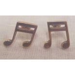 A PAIR OF 9ct MUSIC NOTE EAR STUDS