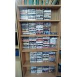 FIVE SHELVES OF DVD'S