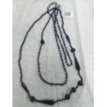 TWO BLACK GLASS BEAD NECKLACES