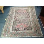 BROWN & RED PATTERNED WOOLEN RUG