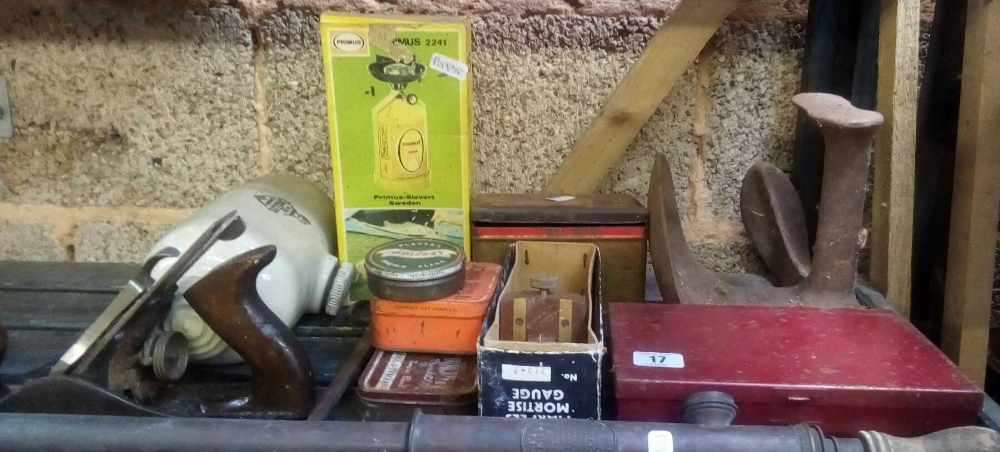 SHELF CONTAINING A SHOE LAST, STONE WATER BOTTLE, STANLEY PLANE, MORTICE GAUGE, PRIMUS STOVE & BRASS