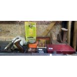 SHELF CONTAINING A SHOE LAST, STONE WATER BOTTLE, STANLEY PLANE, MORTICE GAUGE, PRIMUS STOVE & BRASS