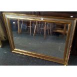 TWO LARGE GILT FRAMED BEVELLED EDGE MIRRORS