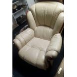 CREAM COLOURED LEATHERETTE ARMCHAIR