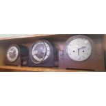 THREE DOMED MANTLE PIECE CLOCKS IN WOOD CASES.