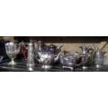 SHELF OF VARIOUS SHAPED PLATED COFFEE POTS, TEA POTS & WATER JUGS