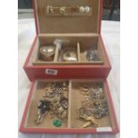 RED JEWELLERY BOX WITH COSTUME JEWELLERY, CHAINS, BROOCHES & EARRINGS ETC