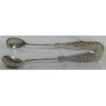 A PAIR OF VICTORIAN SILVER ATTRACTIVE SUGAR TONGS - B'HAM 1894