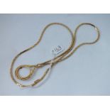 A LONG FLAT LINK NECK CHAIN IN 9CT WITH VACANT COIN SUSPENSION - 26gms