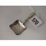 A Georgian caddy spoon with square bowl engraved with a flower with foliage - B'ham 1830 by U&H