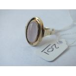 A large pink stone ring set in 8ct gold - size Q - 3.5gms