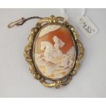 A large cameo of a lady on horse back