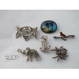 Five silver brooches & pendants