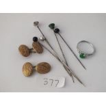 A bag containing hat pins, gilt cufflinks & a dress ring etc.