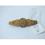 A Victorian 15ct gold brooch - 2.8gms