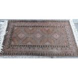 Three medallion rug - 4'9" x 2'9"