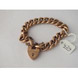 A CURB LINK BRACELET WITH HEART PADLOCK IN 9CT - 18.7gms