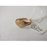 A small heart shaped signet ring in 9ct - size K - 1.5gms