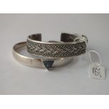 Two silver torque bangles - 56gms