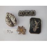 Four silver brooches