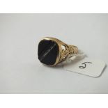 A gents signet ring in 9ct - size Z . 4.1gms