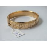 A rolled gold bangle