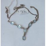 A aquamarine 6 stone drop pendant necklace set in silver