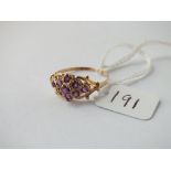 An vintage amethyst cluster ring in 9ct - size W - 1.8gms