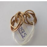 A pair of fancy knot hooped earrings in 9ct - 2.9gms