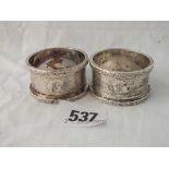 A pair of napkin rings with cast boarders - B'ham 1915 - 70gms