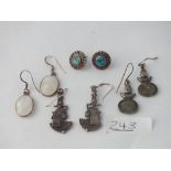 Four pairs of silver ear pendants