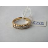 A five stone diamond ring in 18ct gold - size Q - 5.1gms