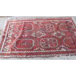 A red ground rug in red & ivory - 6' x 3'8"