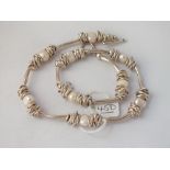 A silver & pearl fancy necklace - 71gms