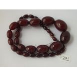 A string of cherry amber beads