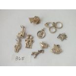 A bag of 10 assorted silver charms - 23gms