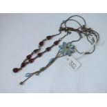 A cabochon garnet necklace & 1 other