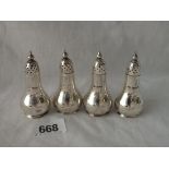 A set of 4 pear shaped peppers each on rimmed foot - Sheffield 1906 - 77gms