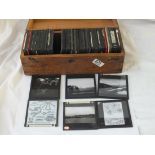 A box containing black and naval and other slides