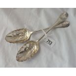 A pair of Georgian bottom marked berry spoons embossed with fruit, 1776/74, 100g